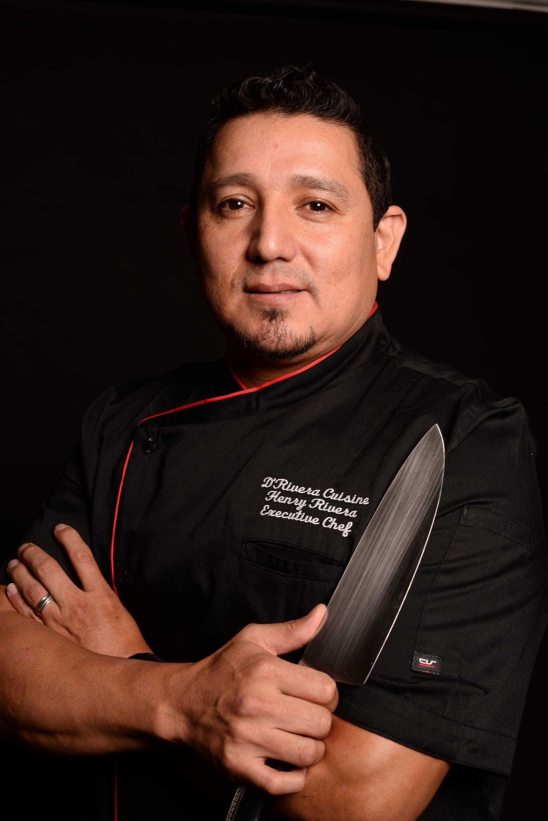 Chef Henry Rivera cooking at commercial line station